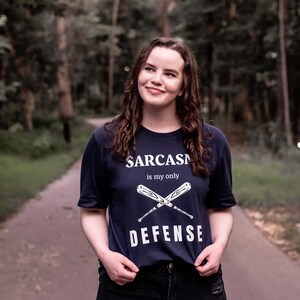 Teen Wolf tv show tshirt with the stiles stilinski, dylan obrien, quote, sarcasm is my only defense, with art of baseball bats, perfect merchandise or christmas gift for any teen wolf fan, gift for her