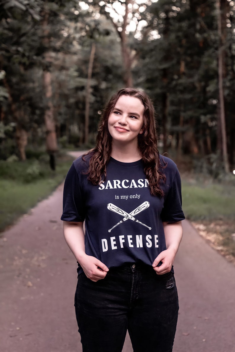 Teen Wolf tv show tshirt with the stiles stilinski, dylan obrien, quote, sarcasm is my only defense, with art of baseball bats, perfect merchandise or christmas gift for any teen wolf fan, gift for her