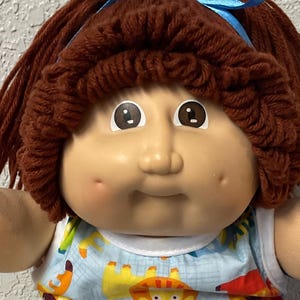 Vintage 1983 Cabbage Patch Kid Doll: Auburn Hair, Brown Eyes, First Edition