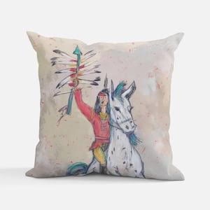 May include: A colorful illustration of a Native American person riding a white horse and holding a feathered headdress. The background is a light beige with a subtle speckled pattern.
