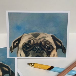May include: A painting of a pug dog's face, looking directly at the viewer. The dog has brown eyes and a wrinkled face. The background is a light blue.