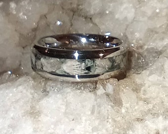 Isle Royal Greenstone and Petoskey inlaid wedding bands.