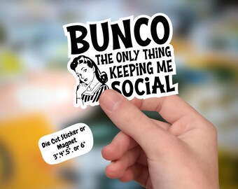 May include: Black and white die-cut sticker or magnet featuring a retro illustration of a woman with the text "BUNCO THE ONLY THING KEEPING ME SOCIAL". Available in 3", 4", 5", or 6" sizes.