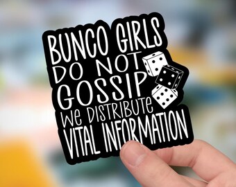 May include: A black die-cut sticker with white text that reads "BUNCO GIRLS DO NOT GOSSIP WE DISTRIBUTE VITAL INFORMATION" and features three small white dice with black pips arranged in a cluster on the right side of the sticker design.
