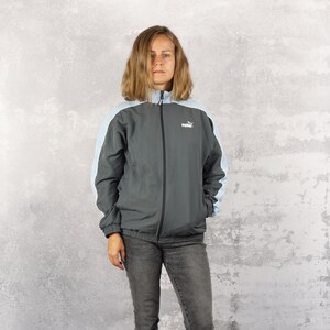 Black hoodless windbreaker on sale