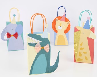 May include: Four colourful paper gift bags with animal designs. Each bag has a party hat and a bow tie. The animals are an elephant, a crocodile, a lion, and a giraffe.