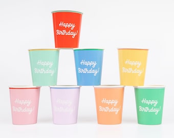 May include: A collection of colorful paper cups with the text "Happy Birthday!" in white script. The cups are in various colors, including red, blue, yellow, pink, and green, with a contrasting rim.