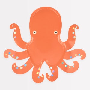 May include: Orange octopus-shaped paper plate with iridescent dots. The plate is perfect for a nautical-themed party.