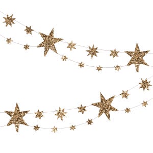 May include: A decorative garland featuring numerous gold glitter stars of varying sizes strung along thin, light-colored threads. The stars are arranged in two horizontal rows, creating a shimmering, festive display of five-pointed shapes.
