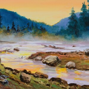 May include: An oil painting depicting a river landscape at sunset. The scene features a flowing river with scattered rocks, surrounded by dark green pine trees and distant blue mountains under a bright orange and yellow sky. Signed SEYMER.