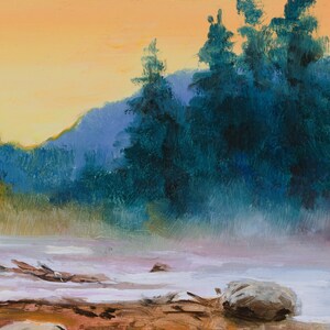 May include: An oil painting depicting a landscape with a bright orange sky above dark blue-green evergreen trees. A misty, light-colored river flows in the foreground, featuring a large gray rock and scattered brown driftwood along the riverbank.