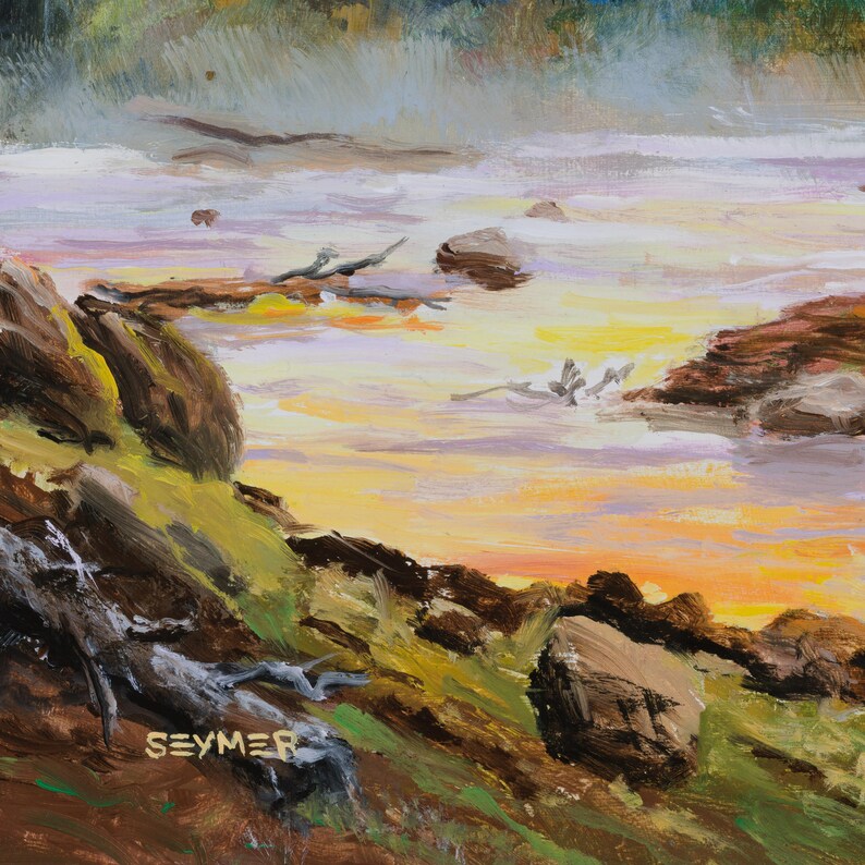 May include: An oil painting depicting a landscape with a rocky shoreline in the foreground, featuring brown and green earth tones. The water reflects a bright yellow and orange sunset, with visible brushstrokes and the signature SEYMER in gold.