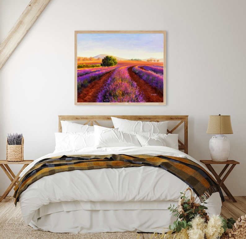 May include: A painting of a lavender field with a dirt road leading through it. The field is a vibrant purple and the road is a warm brown. There is a small tree in the middle of the road.