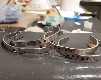 Hand stamped personalised bracelets