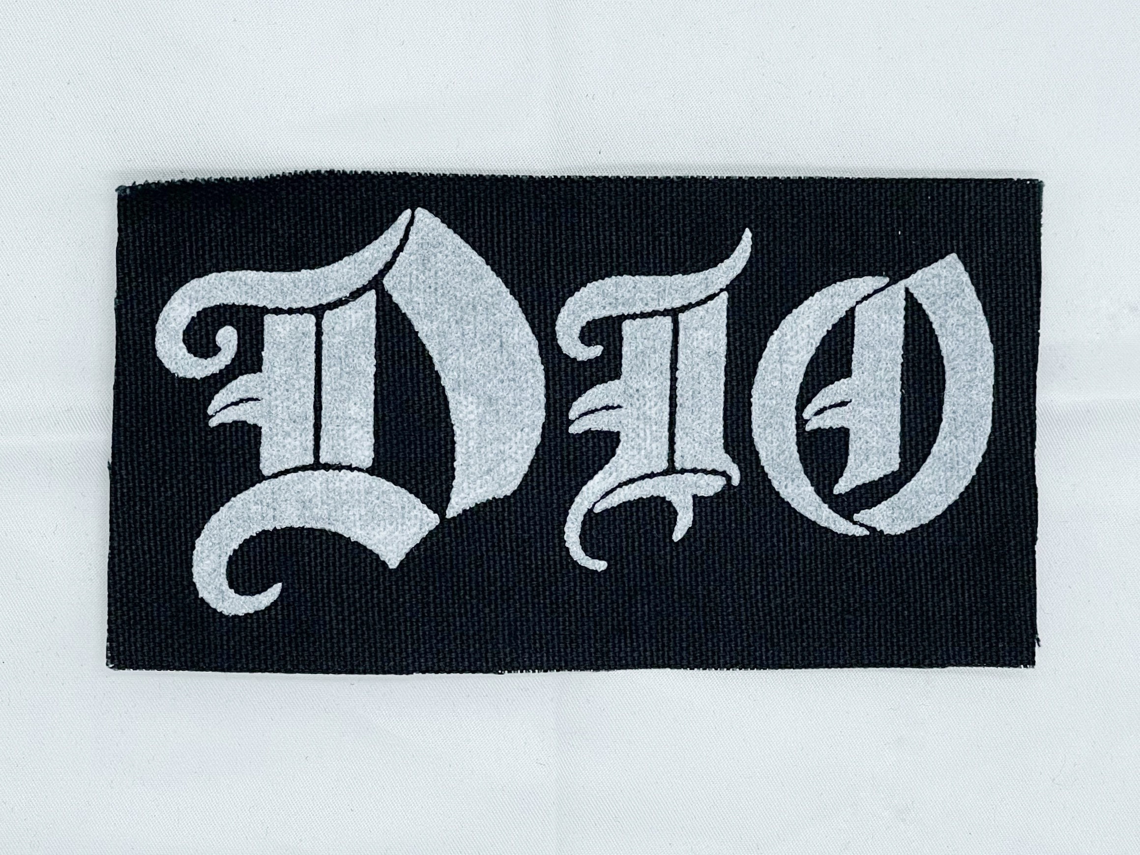 The Logo Man Acrylic Dio 3D Car Bike Sticker, 3.14 x 1.18 x 0.11 Inches,  Black : Amazon.in: Car & Motorbike