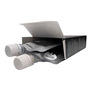 May include: A black box with a silver foil packet inside. The packet has the words "Knead Well Bien Petrir" printed on it.