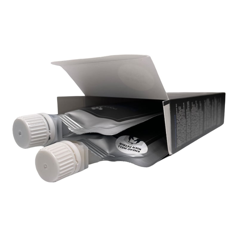 May include: A black box with a silver foil packet inside. The packet has the words "Knead Well Bien Petrir" printed on it.