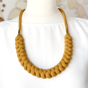 Versatile and stylish long knotted cotton rope necklace made from lightweight soft cotton cord, an ideal piece of accessory or a gift