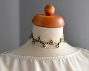 One of a kind crocheted choker with leaf shaped details made from cotton and silk thread, finished with sterling silver hardware