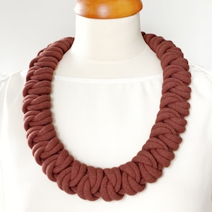 Versatile and stylish chunky knotted cotton rope necklace made from lightweight soft cotton cord, an ideal piece of textile accessory