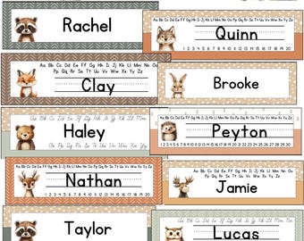 May include: A set of woodland-themed name tags with animal illustrations, including a raccoon, fox, bear, deer, and owl. The tags feature names like Rachel, Clay, and Nathan, with lines for writing and the text "out of the WOODS".