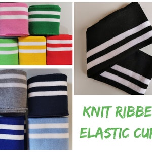 May include: Assortment of knit ribbed elastic cuffs in various colours, including pink, green, yellow, red, grey, blue, and light blue. Each cuff has two white stripes.