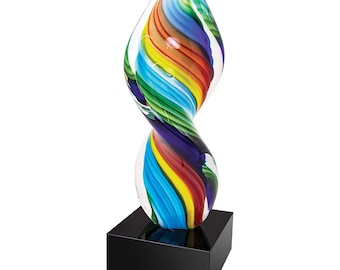 May include: A colorful glass sculpture with a rainbow swirl design on a black base.