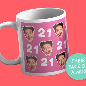 May include: White ceramic mug with a pink background and multiple images of a person's face. The number 21 is repeated throughout the design. The text "THEIR FACE ON A MUG" is on a teal circle.