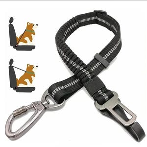 May include: Black and gray dog car safety harness with a metal clip and a seatbelt attachment. The harness is made of a stretchy material and has a reflective stripe.