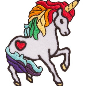 May include: A white unicorn with a rainbow mane and tail. The unicorn has a red heart on its side and a gold horn.