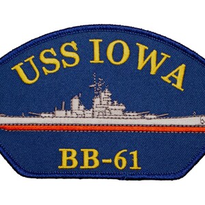 May include: A blue and white embroidered patch with the text "USS IOWA BB-61" and a white silhouette of a battleship.