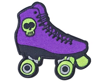 May include: Purple roller skate with black wheels and green accents. The skate has a skull design on the side.