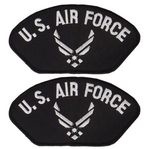 May include: Two black embroidered patches with white lettering and a white Air Force logo. The patches read "U.S. AIR FORCE".