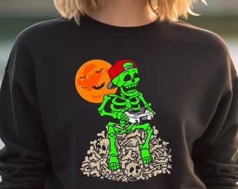 Cute Halloween Skeleton Game boy Shirt, Halloween Shirt, Funny boys gamer Halloween kids shirt, Trick or Skeleton playing games on bones Tee