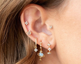 Gouden oorbellenset voor meerdere piercings - sierlijke studs, hangertjes en hoepels