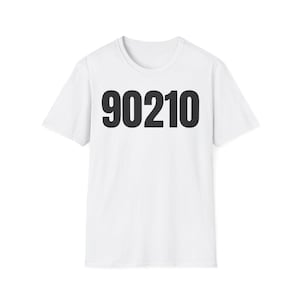 May include: White t-shirt with the black text "90210" printed across the front. The shirt has a crew neck and short sleeves. The text is in a bold, sans-serif font.