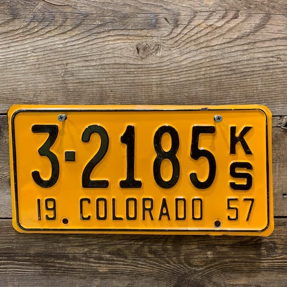 1957 Colorado License Plate, Yellow with Black Lettering, 12"