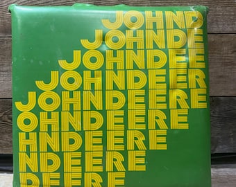 John Deere, stadionzitkussen, jaren 1970, grafisch ontwerp 'step-down'