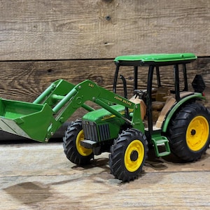 ERTL, John Deere 5420 traktor, med 541 frontlastare, skala 1:16, gjuten