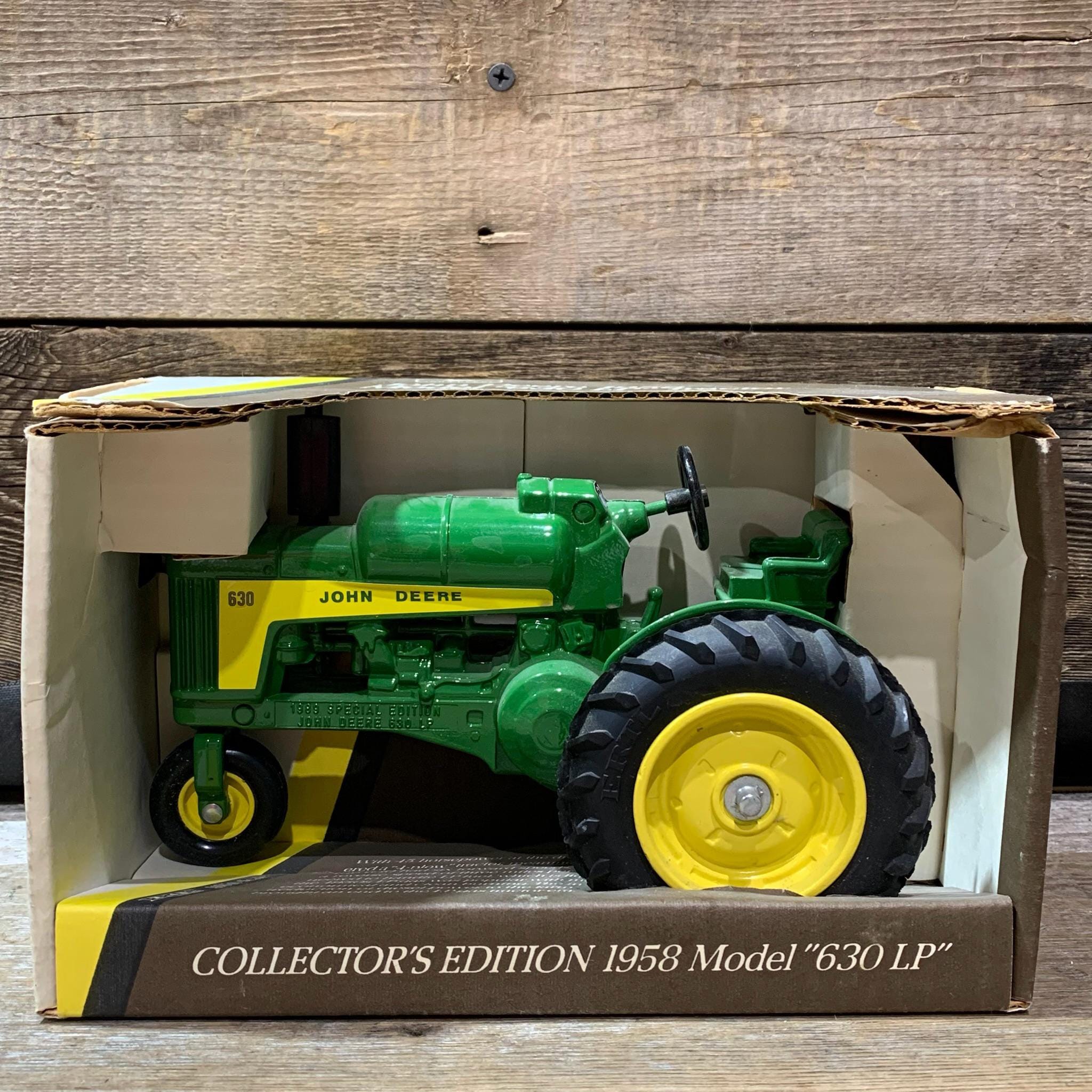 Marketplace : Tracteur avec voie large JOHN DEERE 630 - ERTL - 1:16