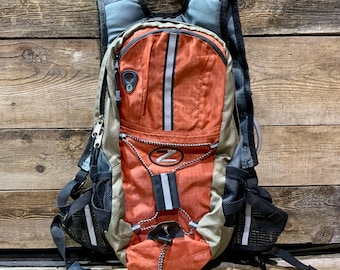 TechskinZ, Hiking Backpack with Hydration Pack System, H2O, Orange