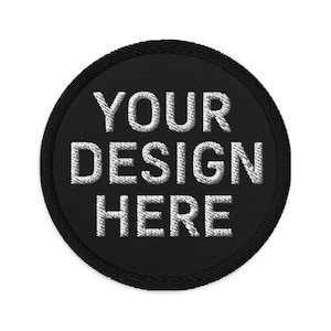May include: A black round patch with white embroidery that says "YOUR DESIGN HERE".