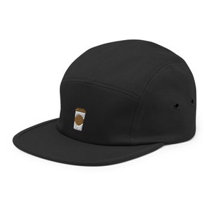 May include: A black 5-panel cap with a brown and white embroidered coffee cup design.