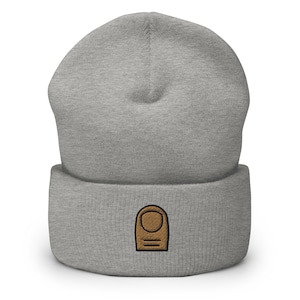 May include: Gray beanie with a brown thumb embroidered on the front.