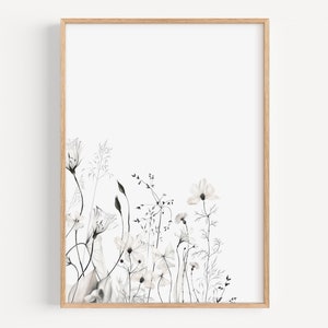 May include: A black and white watercolor illustration of a bouquet of wildflowers in a simple frame. The flowers are delicate and have a soft, romantic feel.