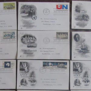 May include: A collection of vintage First Day of Issue envelopes. Each envelope features unique illustrations and stamps, including portraits, historical scenes, and commemorative designs. The envelopes are addressed to Mr. Richard Connelly.