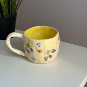 Handmade berries ceramic mug