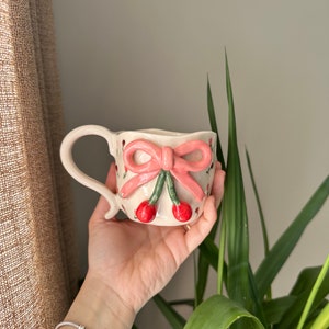 Cherry bow handmade ceramic mug