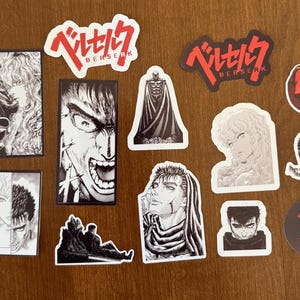 May include: A collection of 11 black and white stickers featuring characters and logos from the manga series Berserk. The stickers feature the Berserk logo, characters Guts, Griffith, Casca, and the brand logo.
