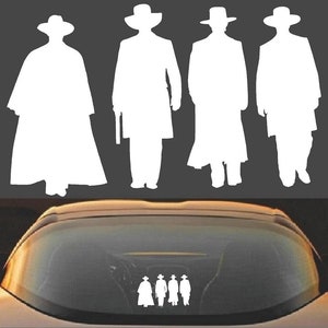 May include: White silhouette decal featuring four figures in cowboy hats and long coats, reminiscent of a Western film. The decal is shown on a car's rear window, with the figures in a row.